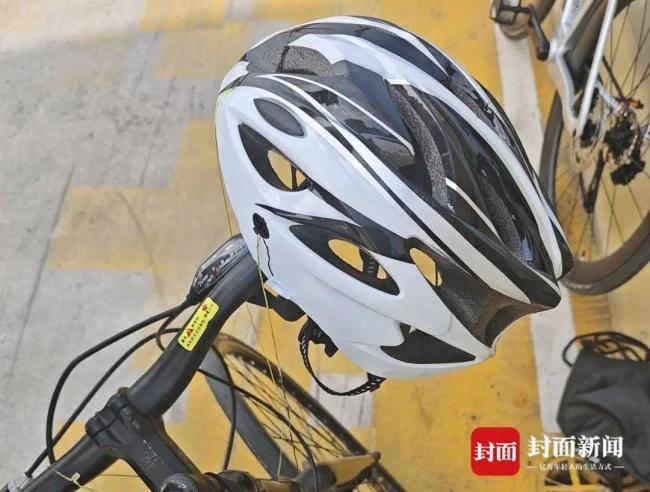 男子骑行遭风筝线割穿头盔 绿道惊魂一刻(图2)