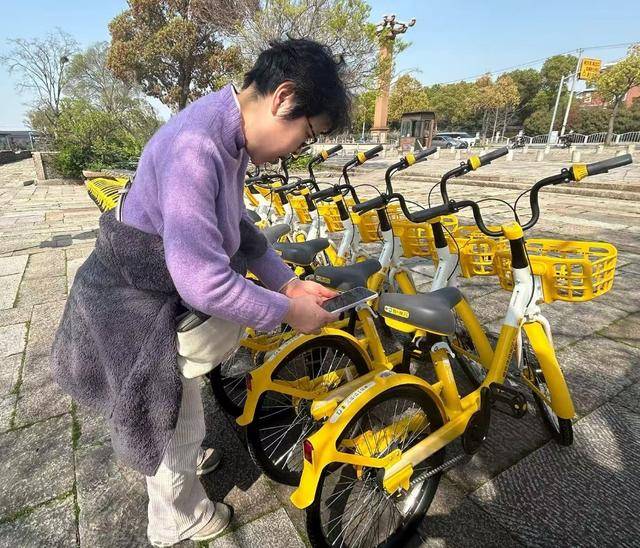 火狐电竞下载松江掀起“骑行热”更有运动款“小黄车”助力(图1)